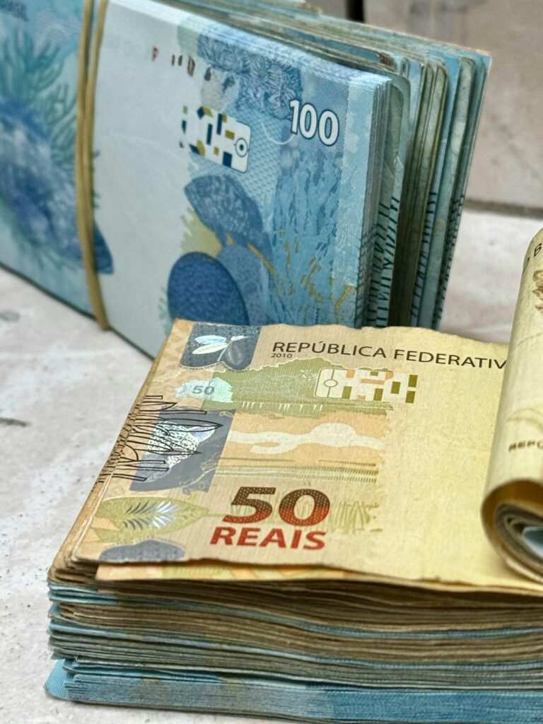 Stacks of cash representing FR44 insurance costs and financial responsibility